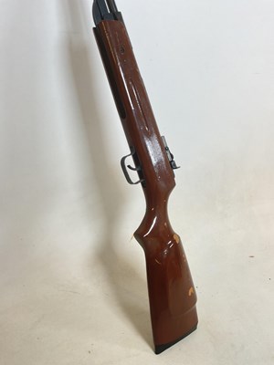 Lot 133 - A vintage air rifle with painted stock.