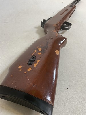 Lot 133 - A vintage air rifle with painted stock.