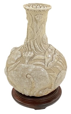 Lot 392 - A 19th century Chinese celadon glazed baluster...