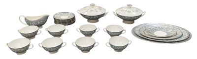 Lot 350 - WEDGWOOD; a part eight setting dinner service,...
