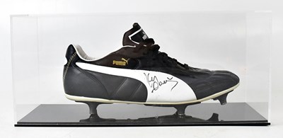 Lot 534 - KENNY DALGLISH; a Puma black and white size 8...