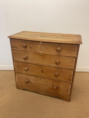 Lot 434 - A pine chest of two short over three long...