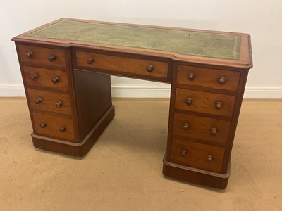 Lot 403 - A late Victorian walnut nine drawer desk of...