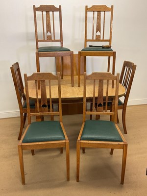 Lot 441 - A light oak Arts and Crafts extending dining...