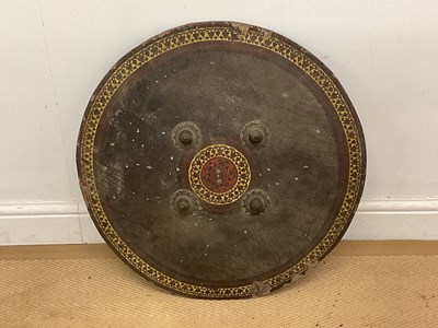Lot 37 - A 19th century painted leather shield with...