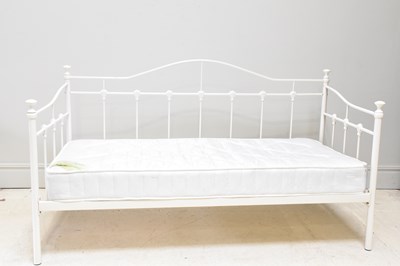 Lot 1063 - A white painted metal day bed, height 92cm,...