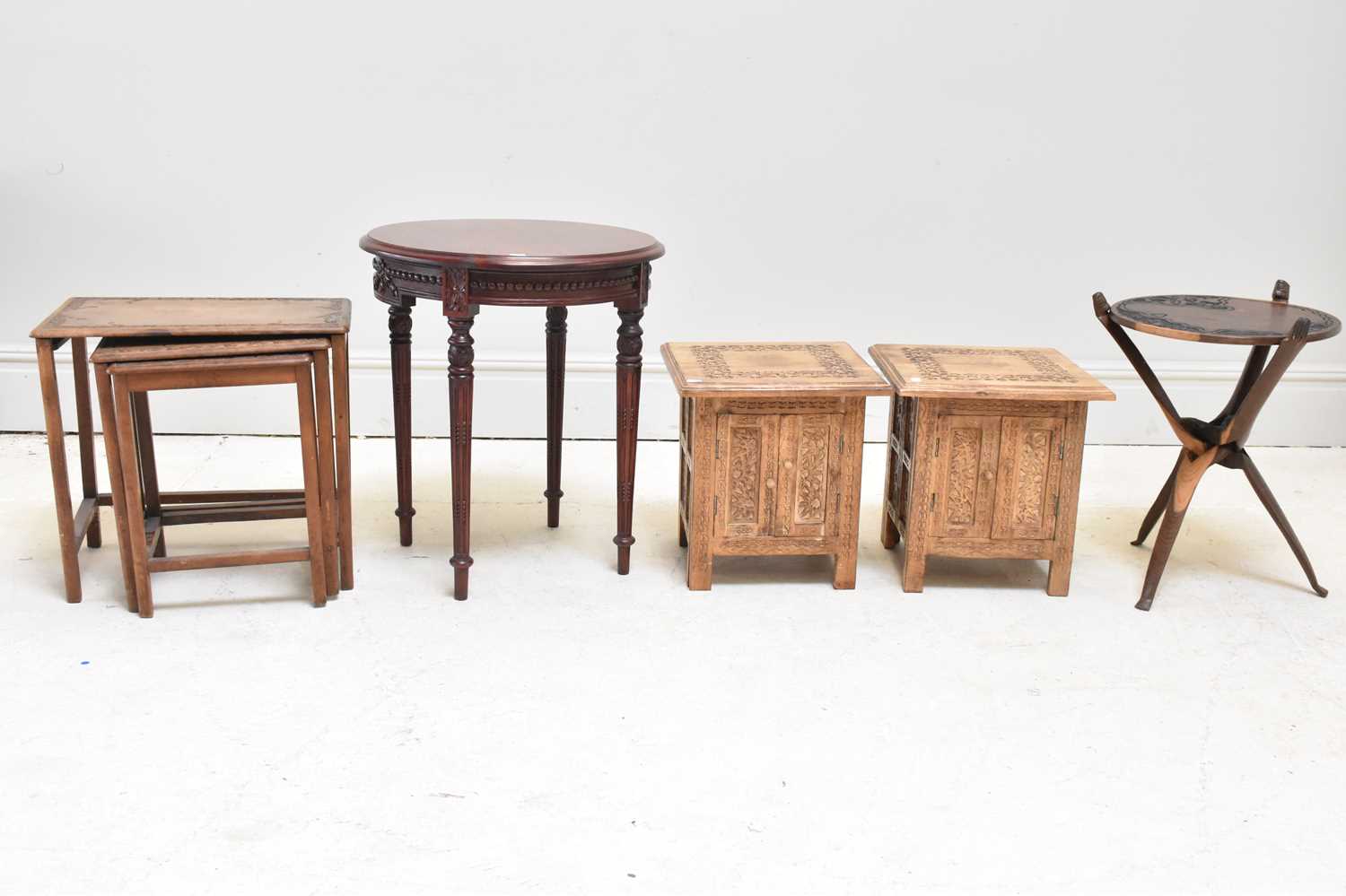 Lot 1066 - A group of reproduction tables including a