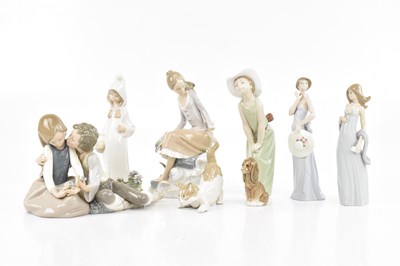 Lot 1597 - LLADRO; a collection of eight figures...