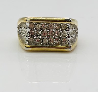 Lot 725 - An 18ct yellow gold pavé set dress ring, size...