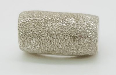 Lot 732 - An 18ct white gold ring with domed panel cut...