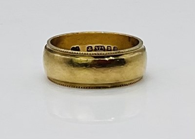 Lot 748 - A 9ct yellow gold wedding band, size N, approx...