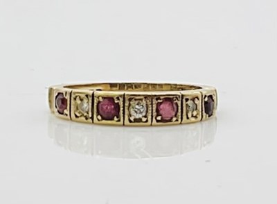 Lot 758 - A 9ct yellow gold half eternity ring, size J...