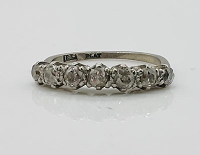 Lot 759 - An 18ct white gold and platinum tipped seven...