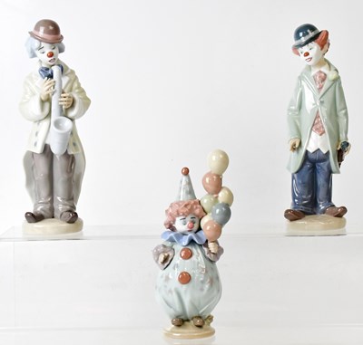 Lot 211A - LLADRÓ; three boxed figures of clowns,...