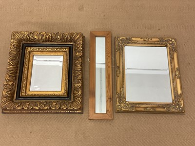 Lot 394 - Three decorative wall mirrors, largest 50 x 47cm.