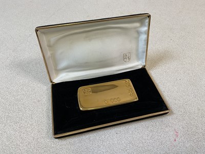 Lot 164 - BERENDSOHN; a gold plated lighter in the form...