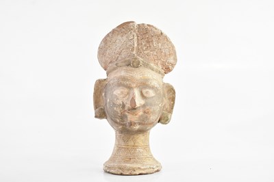 Lot 1198 - An antique terracotta bust of a deity, with...