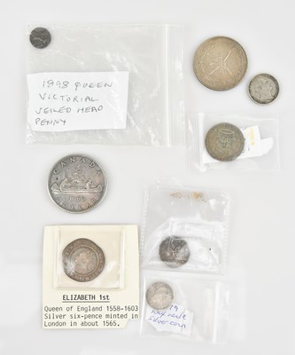 Lot 588 - A small collection of coins including an...