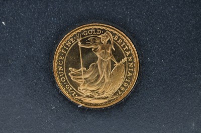 Lot 590 - A Queen Elizabeth II 1/10 ounce fine gold coin,...