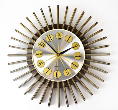 Lot 79 - WESTCLOX; a vintage Sunburst wall clock,...