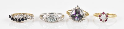 Lot 2528 - Four 9ct gold dress rings, including a cluster...