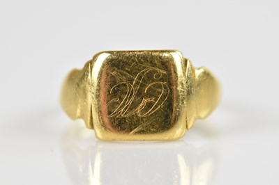 Lot 2303 - An 18ct yellow gold signet ring, the square...