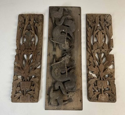 Lot 49 - A Chinese relief carved dragon decorated panel,...