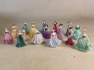 Lot 169 - COALPORT; a collection of porcelain figures of...