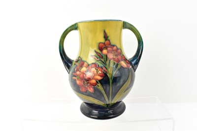 Lot 129 - WILLIAM MOORCROFT; a flambé 'Freesia' pattern...