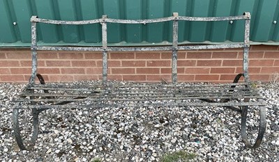 Lot 357 - A wrought iron bench, 86 x 152cm.