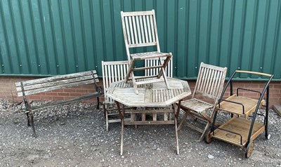 Lot 358 - A teak table, 73 x 103cm, and chairs, with a...