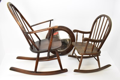 Lot 2 - A dark wood Ercol stick-back rocking chair, a...