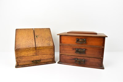 Lot 248 - A small tabletop chest of three drawers, with...