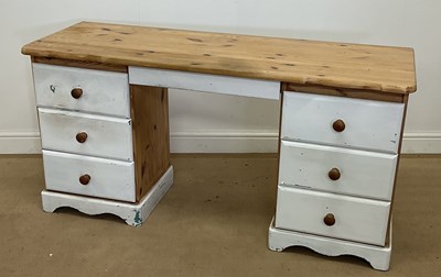Lot 395 - A pine kneehole desk, with three white painted...