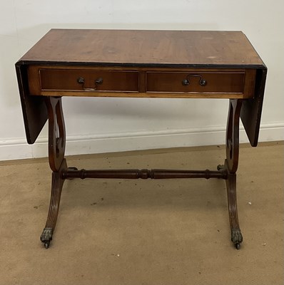 Lot 411 - A reproduction drop-flap table, with stretcher...