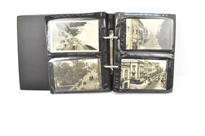 Lot 277 - An album containing approximately two hundred...