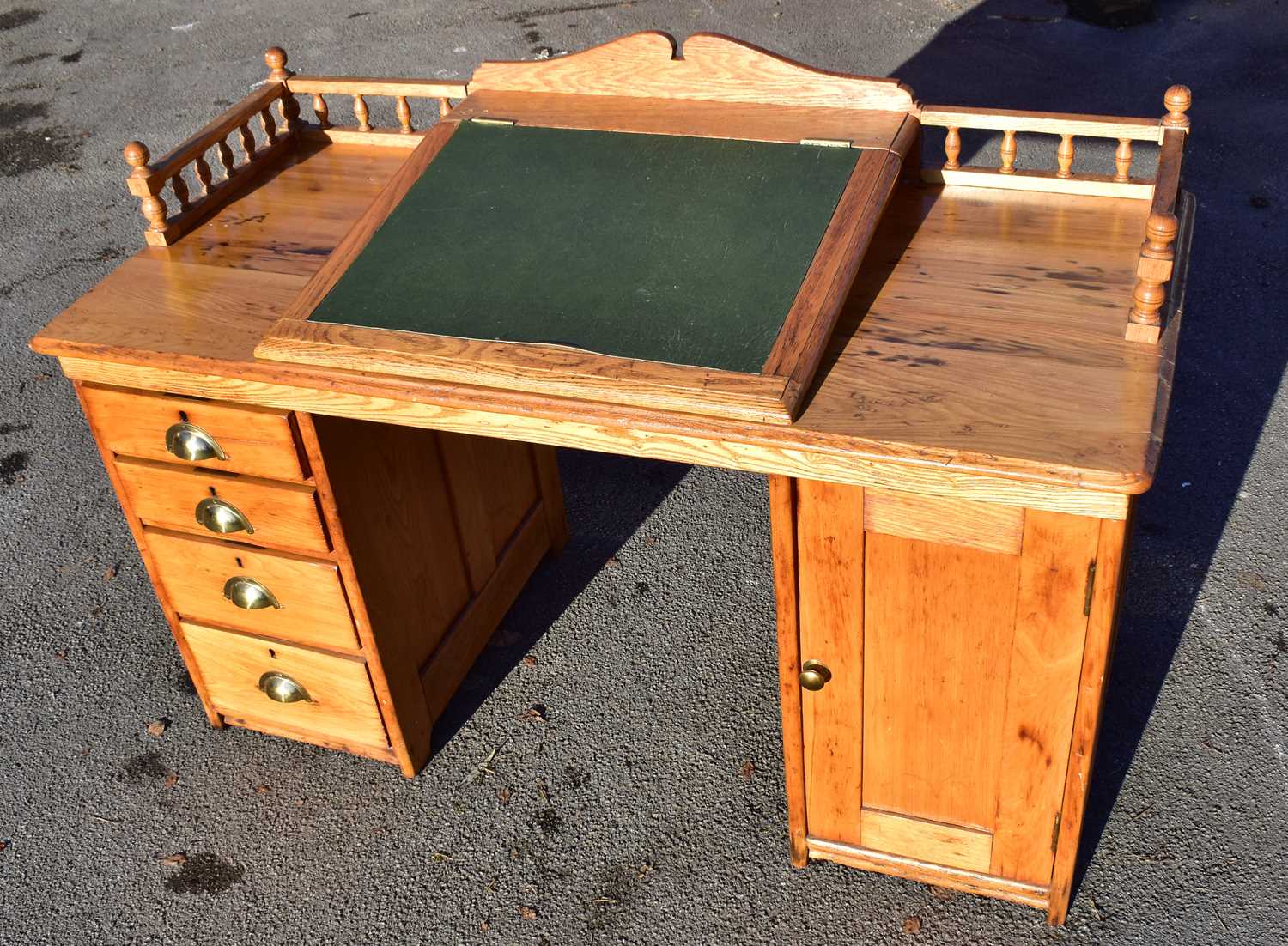 Lot 1487 - A 19th century oak and pine desk, the raised...