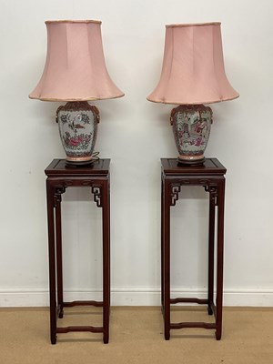 Lot 365 - A pair of Chinese hardwood jardiniere stands,...