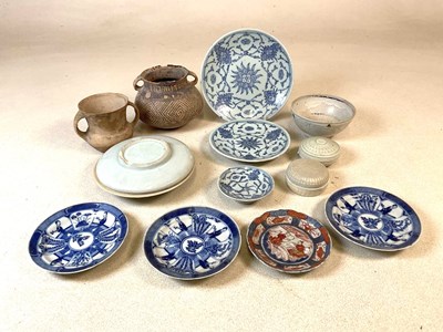 Lot 42 - VUNG TAO CARGO; a cream glazed footed bowl,...