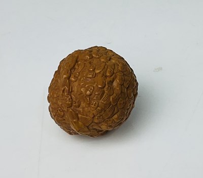 Lot 96 - An unusal Japanese Meiji period carved walnut...