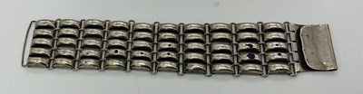 Lot 767 - A broad unmarked, presumed silver, bracelet of...