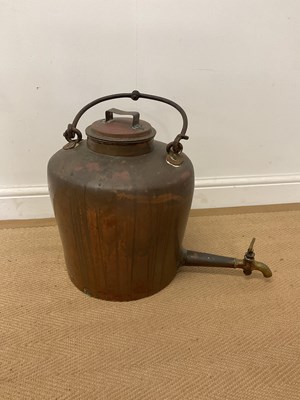 Lot 315 - A very large copper urn, with brass tap.