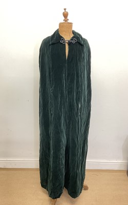 Lot 264 - QUAD; a vintage green velvet full length...