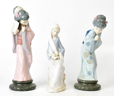 Lot 108 - LLADRÓ; three figures of young women,...
