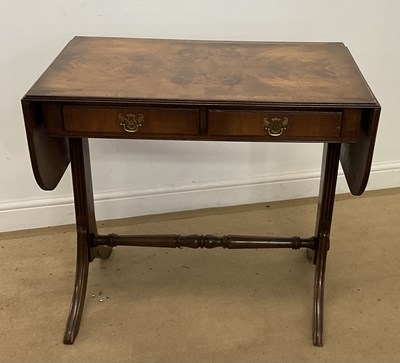 Lot 447A - A reproduction drop-flap table with twin...