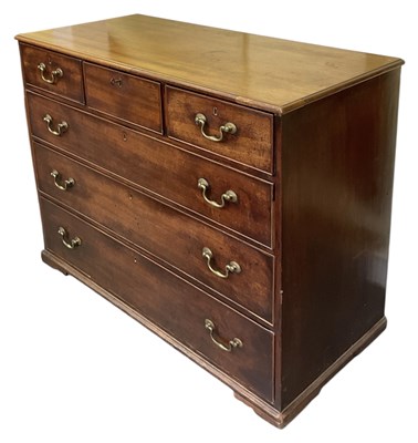 Lot 39 - An early 19th century mahogany chest of three...