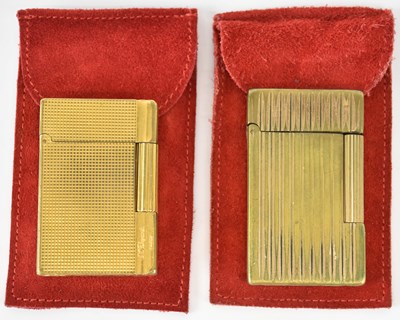 Lot 223 - S. T. DUPONT; a French gold plated cigarette...