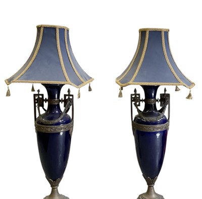 Lot 64 - A pair of 19th century blue lustre glazed twin...