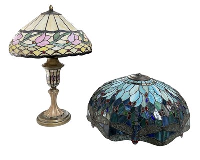 Lot 73 - IN THE MANNER OF TIFFANY & CO; a modern resin...
