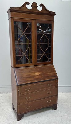 Lot 138 - An Edwardian mahogany bureau bookcase, with...